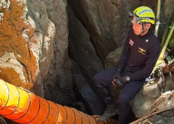 Heavy rains threaten to delay search for 2 people missing in Laos cave