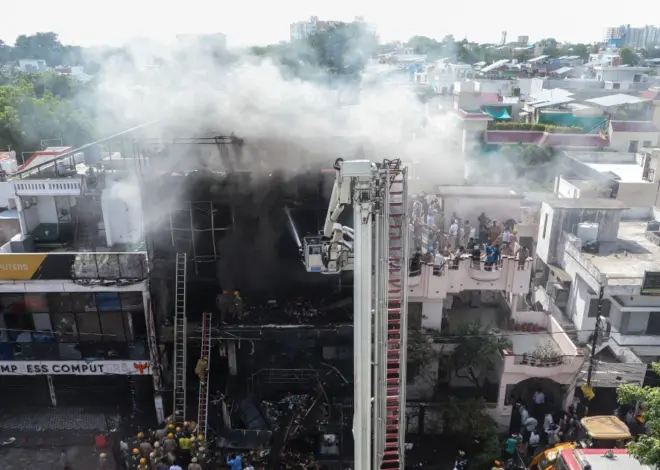 Fire tears through building in northern India, killing 14, mostly students