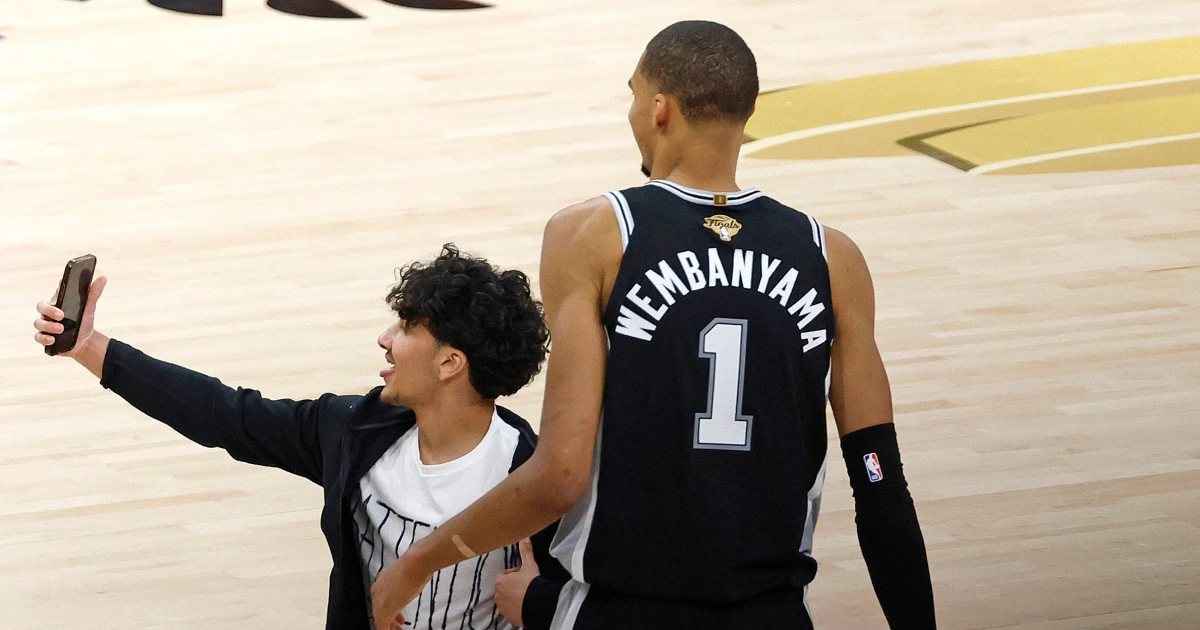 NBA bans two fans for life after one runs onto the court during, attempts selfie with Wemby