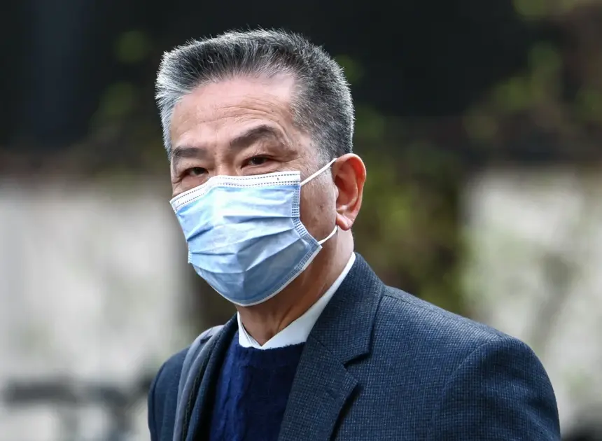 A U.K. border official and a former Hong Kong cop sentenced for spying on China’s behalf