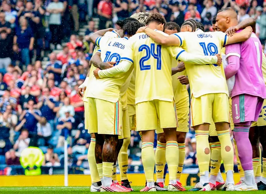 The smallest nation ever to qualify for the World Cup didn’t do it alone