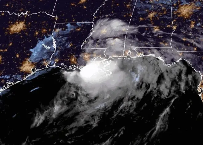 Tropical Cyclone Arthur weakens to a low pressure area along the upper Texas coast