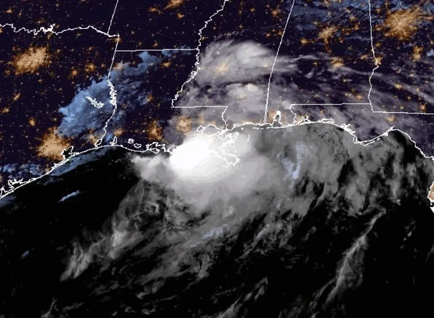 Tropical Cyclone Arthur weakens to a low pressure area along the upper Texas coast