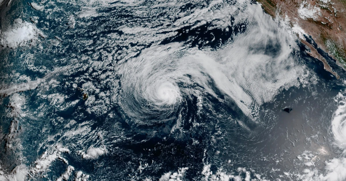 Major Hurricane Genevieve roars in the Pacific as Fausto weakens to a tropical storm near Hawaii