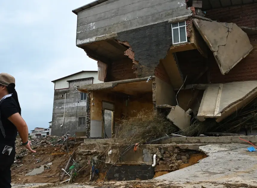 Dozens killed, snakes on the loose after flooding from days of heavy rain in southern China