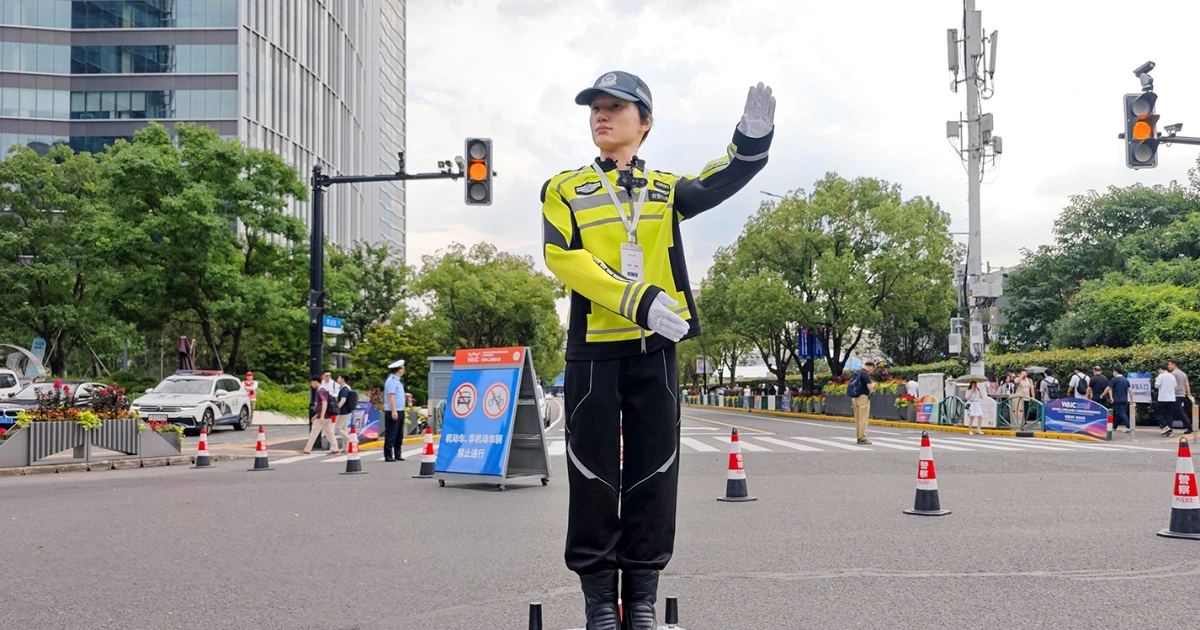 Inside China’s biggest AI show: Robot police, dancing humanoids and a roof collapse