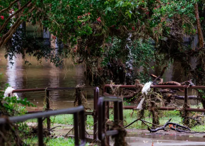 Texas flooding surges from huge rainstorms as rescuers pull people from rising waters