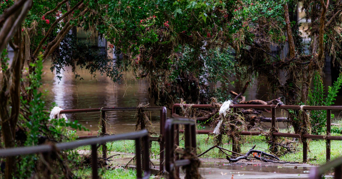 Texas flooding surges from huge rainstorms as rescuers pull people from rising waters