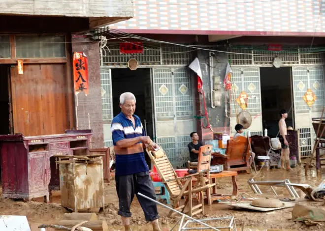 Southern Chinese region reels from floods and destruction from remnants of tropical storm