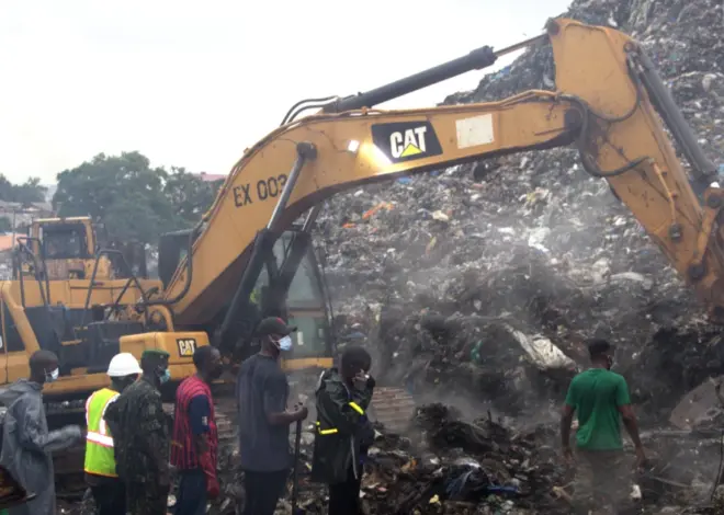 A landslide at a landfill in the capital of Guinea kills 30 people, officials say