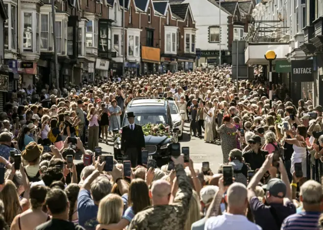 Bonnie Tyler fans line the streets of a Welsh village as her coffin is brought home