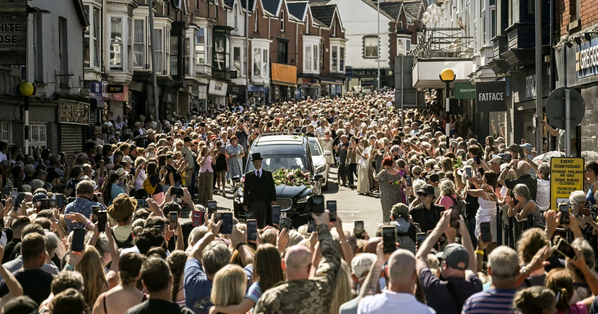 Bonnie Tyler fans line the streets of a Welsh village as her coffin is brought home