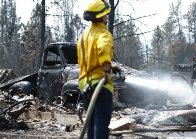 Nearly 100 large wildfires strain firefighting resources across the U.S.