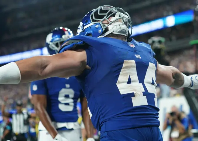 Giants’ offense rolls over the Cowboys to give coach John Harbaugh a 28-20 win in his debut