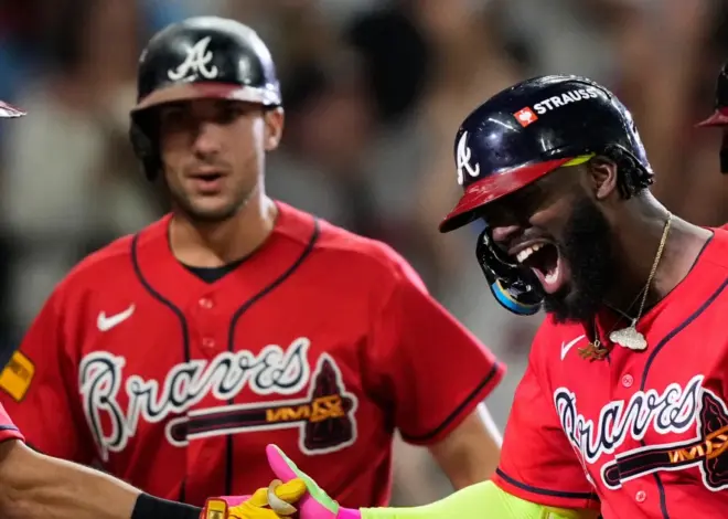 Braves hit 3 homers to beat Phillies 6-2 in wild card clincher
